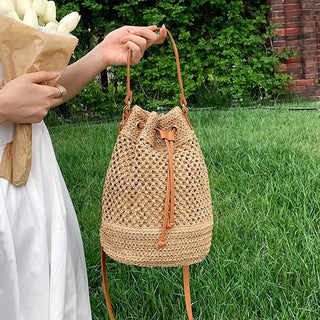 Women's summer straw shoulder bag: Hand - woven drawstring bucket style - Bayu